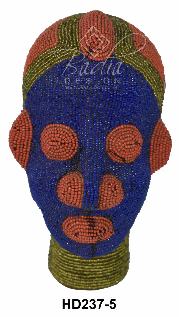 Beaded head with blue, orange, and green colors on a white background