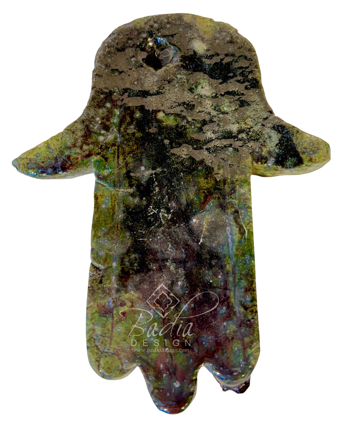 A Hamsa hand pendant made of polished Hessonite (molybdenite) featuring a rich, multicolored play of metallic green, gold, purple, and blue iridescence over a dark base. A watermark for &