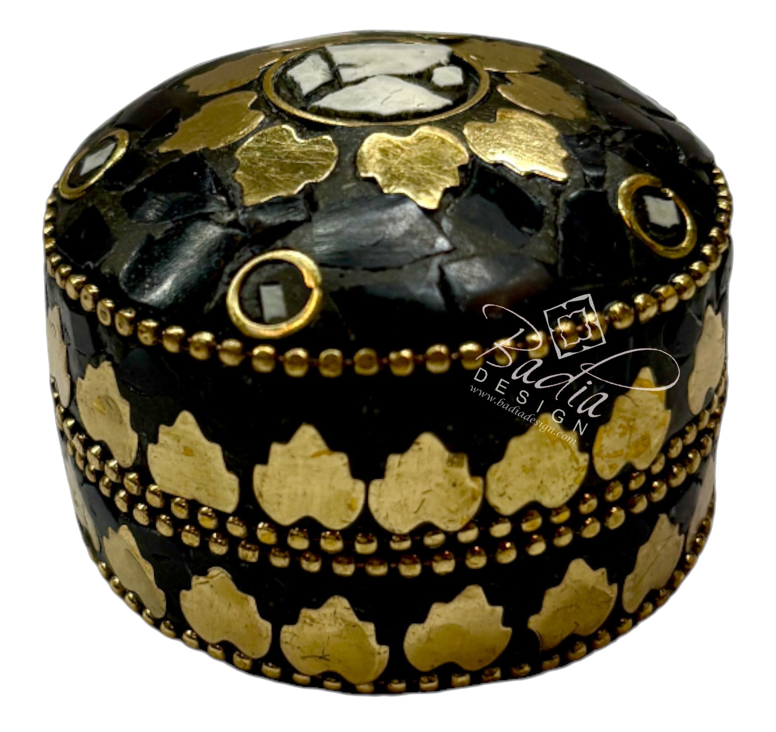 Decorative black and gold box with intricate patterns on a white background