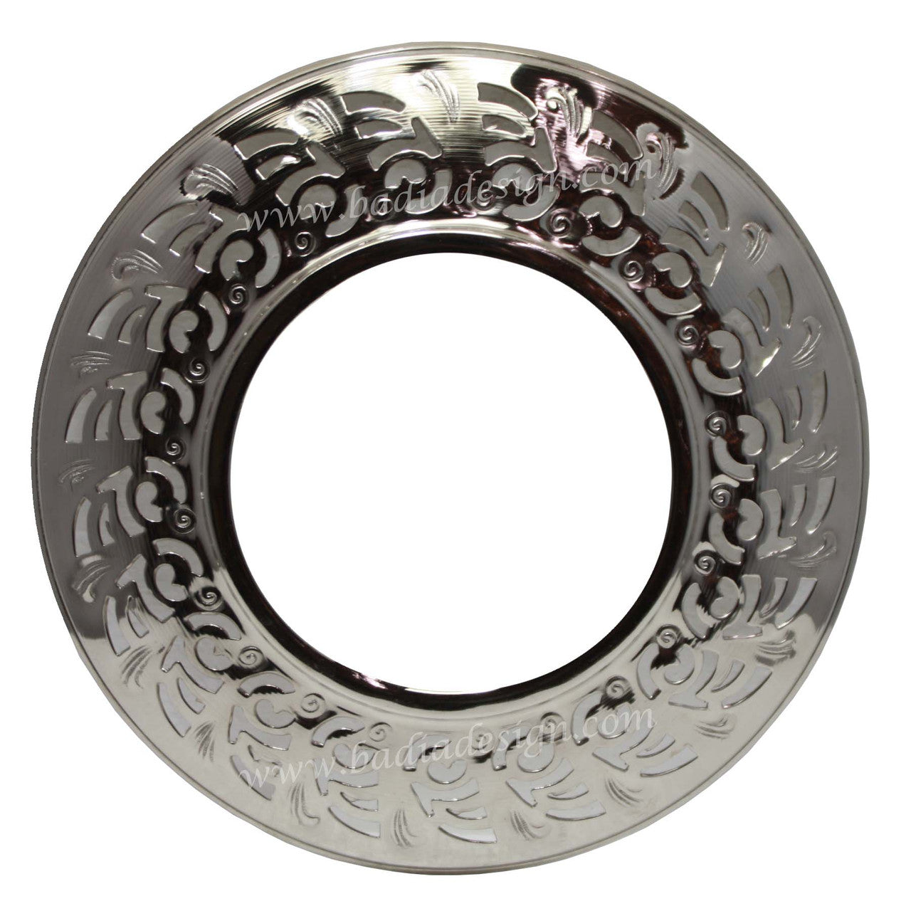 Decorative silver plate with intricate patterns on a white background