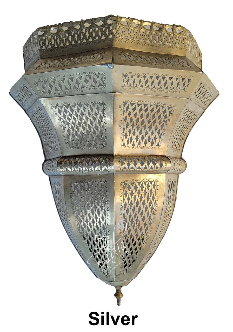 Decorative silver wall light fixture with intricate patterns on a white background