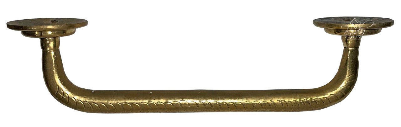 Decorative brass handle on a white background