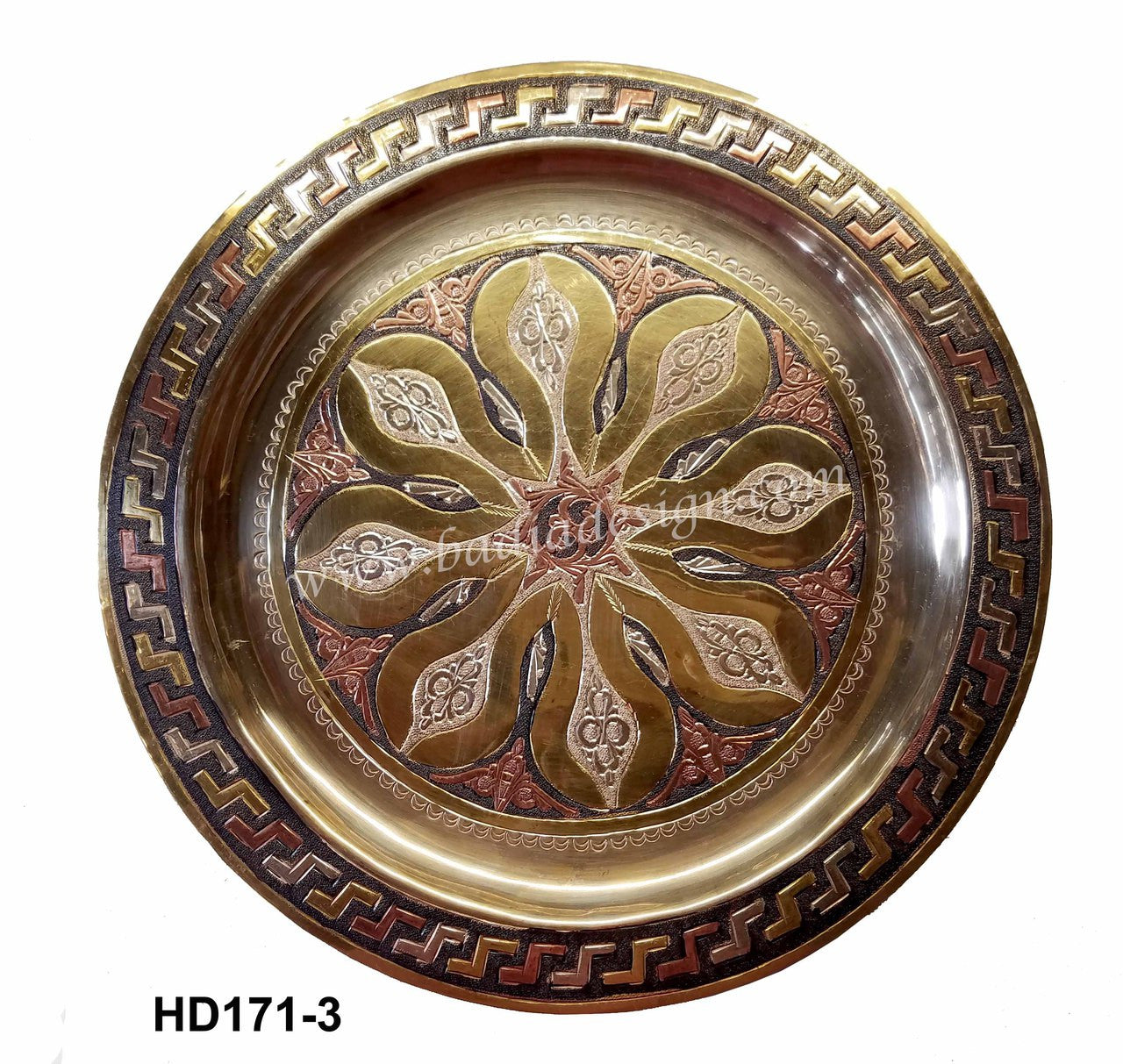 Decorative metal tray with floral design and intricate border on a white background