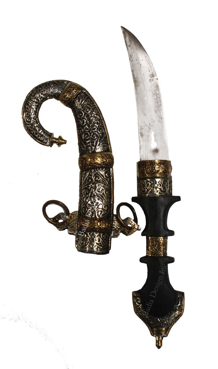 Decorative dagger with ornate hilt on a white background