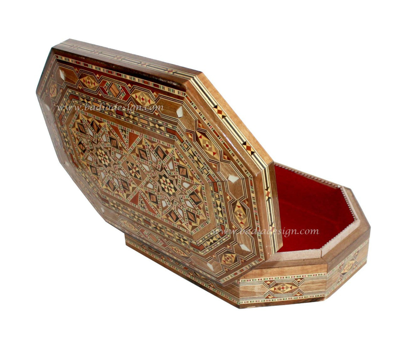Decorative wooden box with intricate patterns on a white background