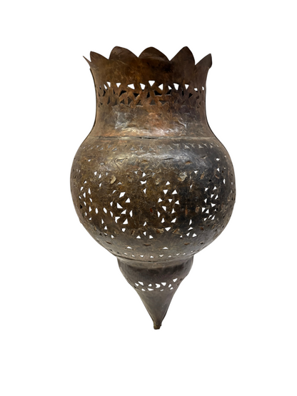 A vintage Moroccan metal lantern with intricate laser-cut geometric patterns, featuring a bulbous body, scalloped rim, and pointed base, shown on a solid white background.