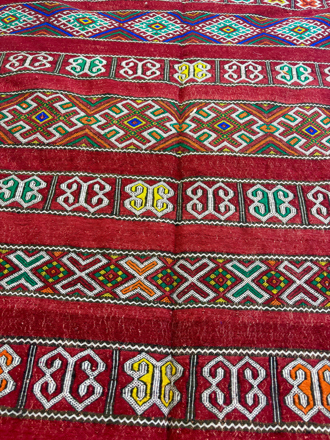 Kilim with Crimson Field and Repeating Glyph Bands