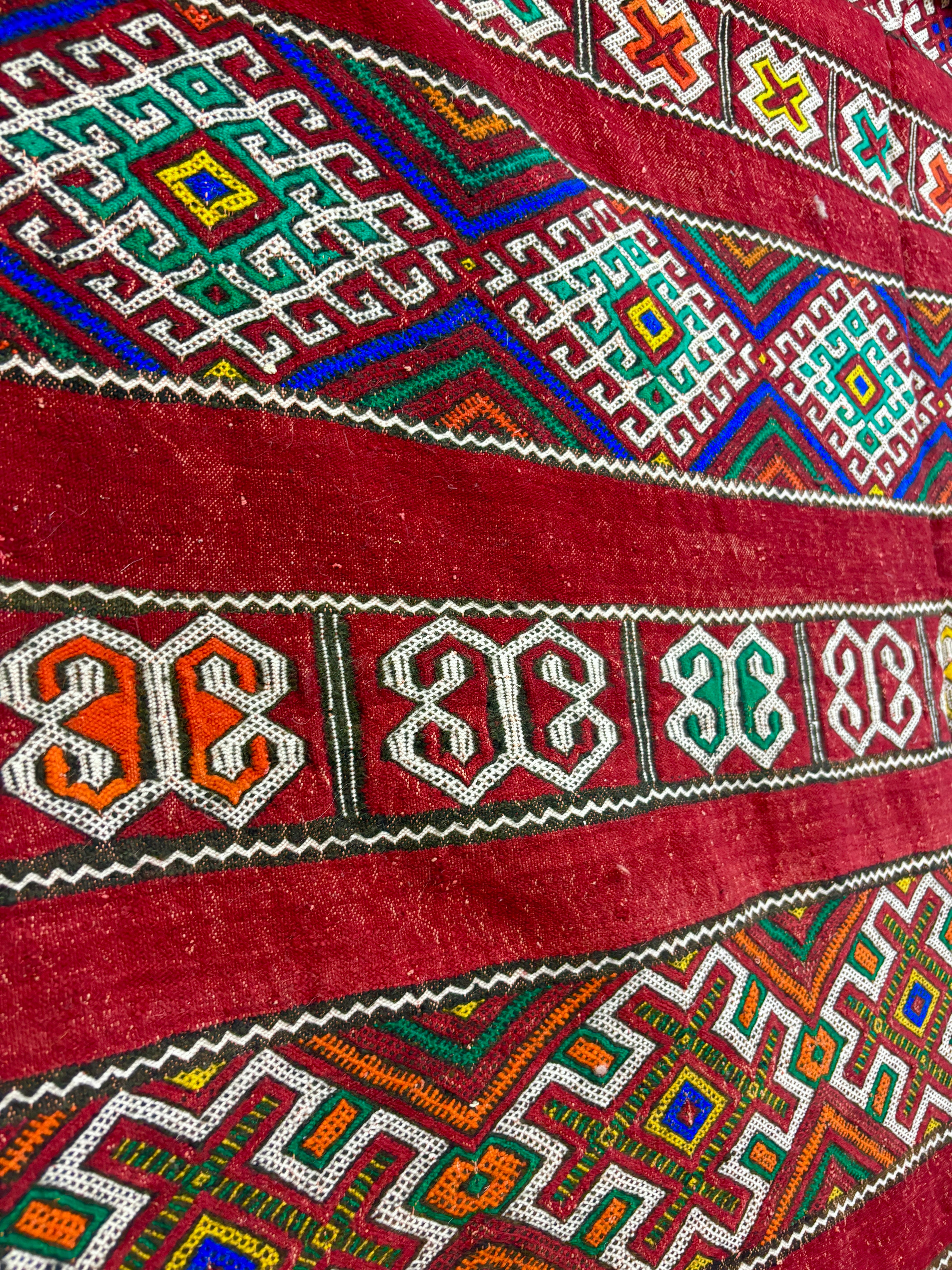 Kilim with Crimson Field and Repeating Glyph Bands