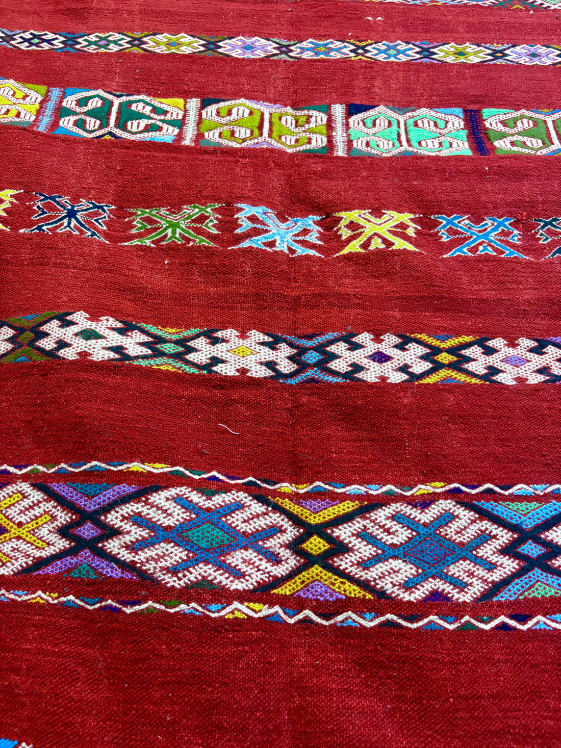 Kilim with Crimson Field and Polychrome Brocaded Bands