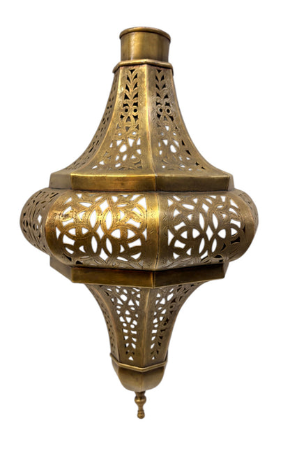An ornate brass Moroccan wall sconce with intricate laser-cut geometric patterns, shown against a plain white background.