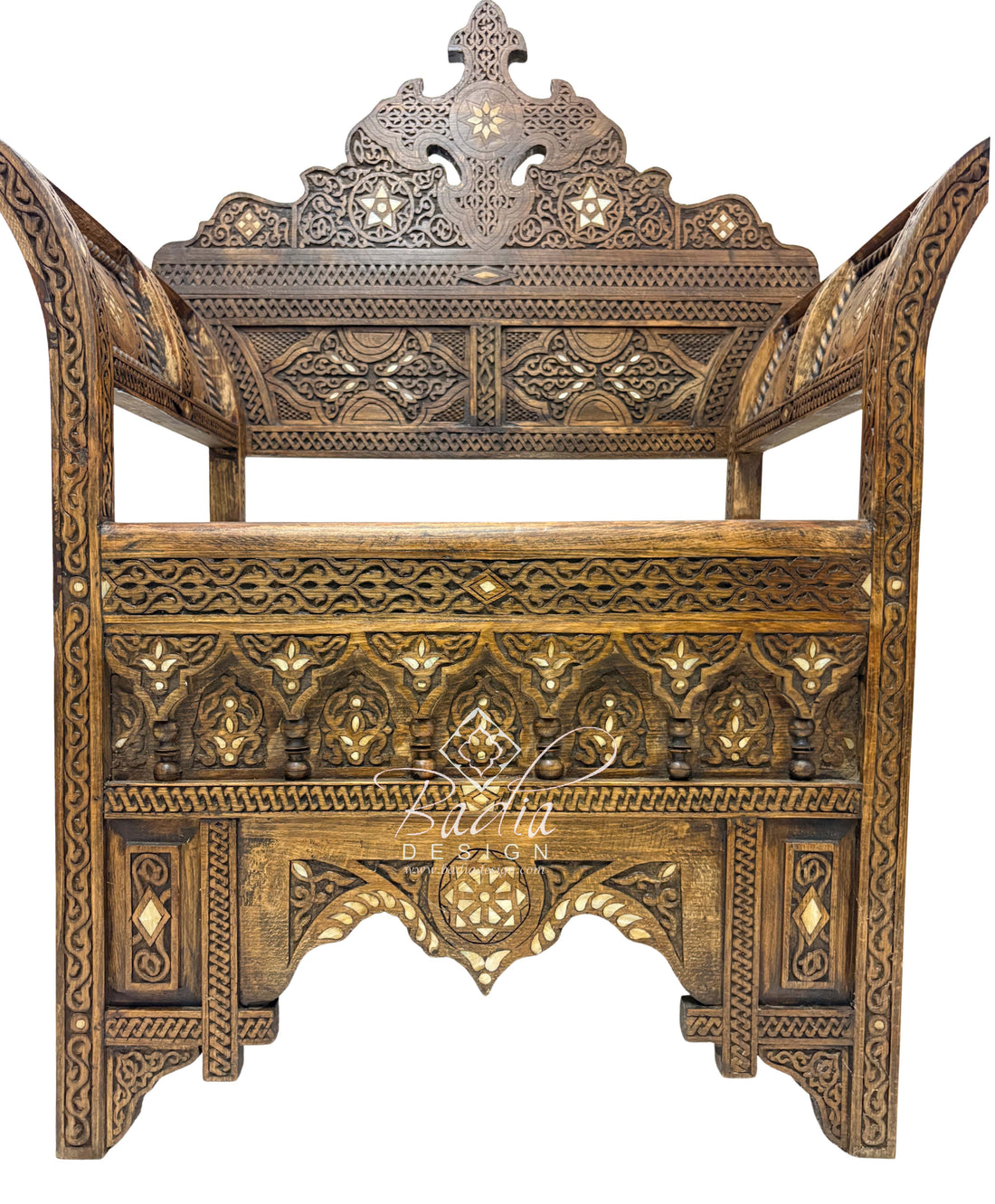 Decorative wooden chair with intricate carvings on a white background