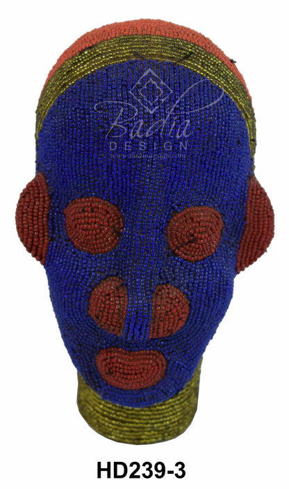 Blue beaded African head with red accents
