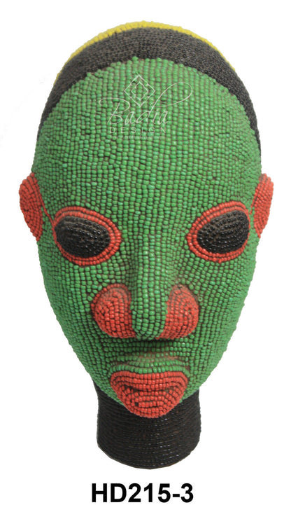 Green beaded African head with red accents on a white background