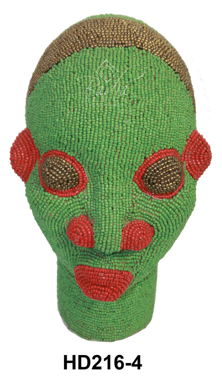 Green beaded head with red and brown accents on a white background