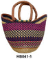 Woven raffia handbag with colorful patterns and leather handles.