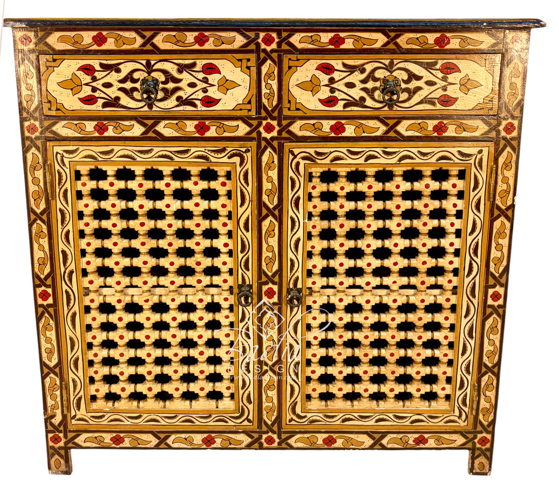 An ornate antique cabinet with two doors, featuring intricate marquetry patterns in beige, black, red, and gold, set against a plain white background.