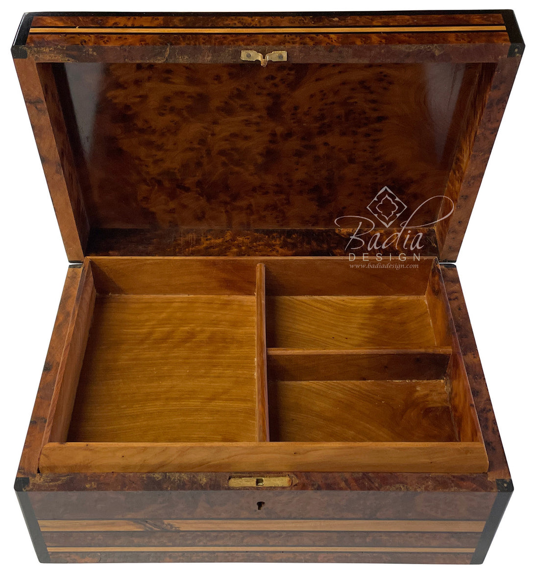 Wooden jewelry box with compartments on a white background