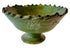 A green glazed ceramic pedestal bowl with a scalloped rim, shown against a plain white background with a &