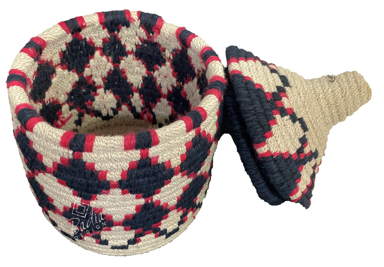 Woven basket with geometric pattern on a white background