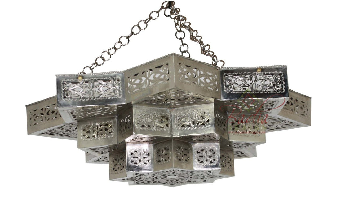 Decorative silver metal chandelier with intricate patterns on a white background