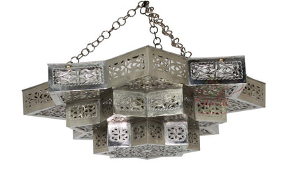 Decorative silver metal chandelier with intricate patterns on a white background
