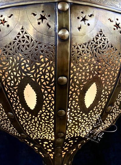 Intricately Designed Brass Chandelier with White Glass Eyelets