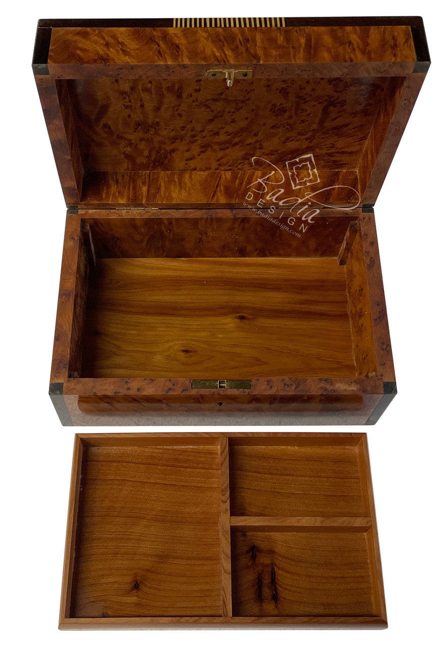 Wooden jewelry box with compartments on a white background