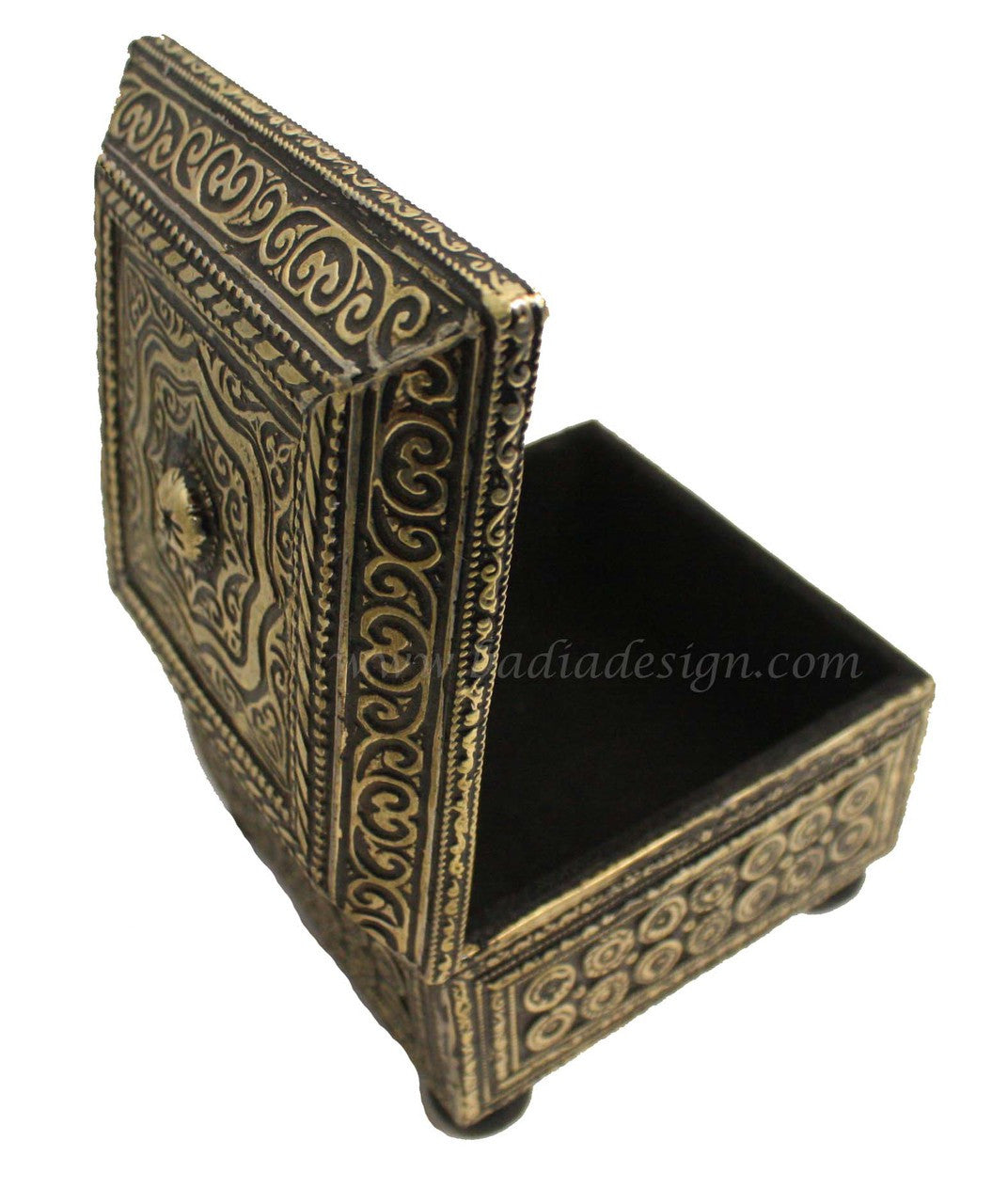 Decorative jewelry box with intricate patterns on a white background