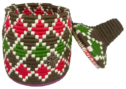 Woven basket with geometric pattern on a white background
