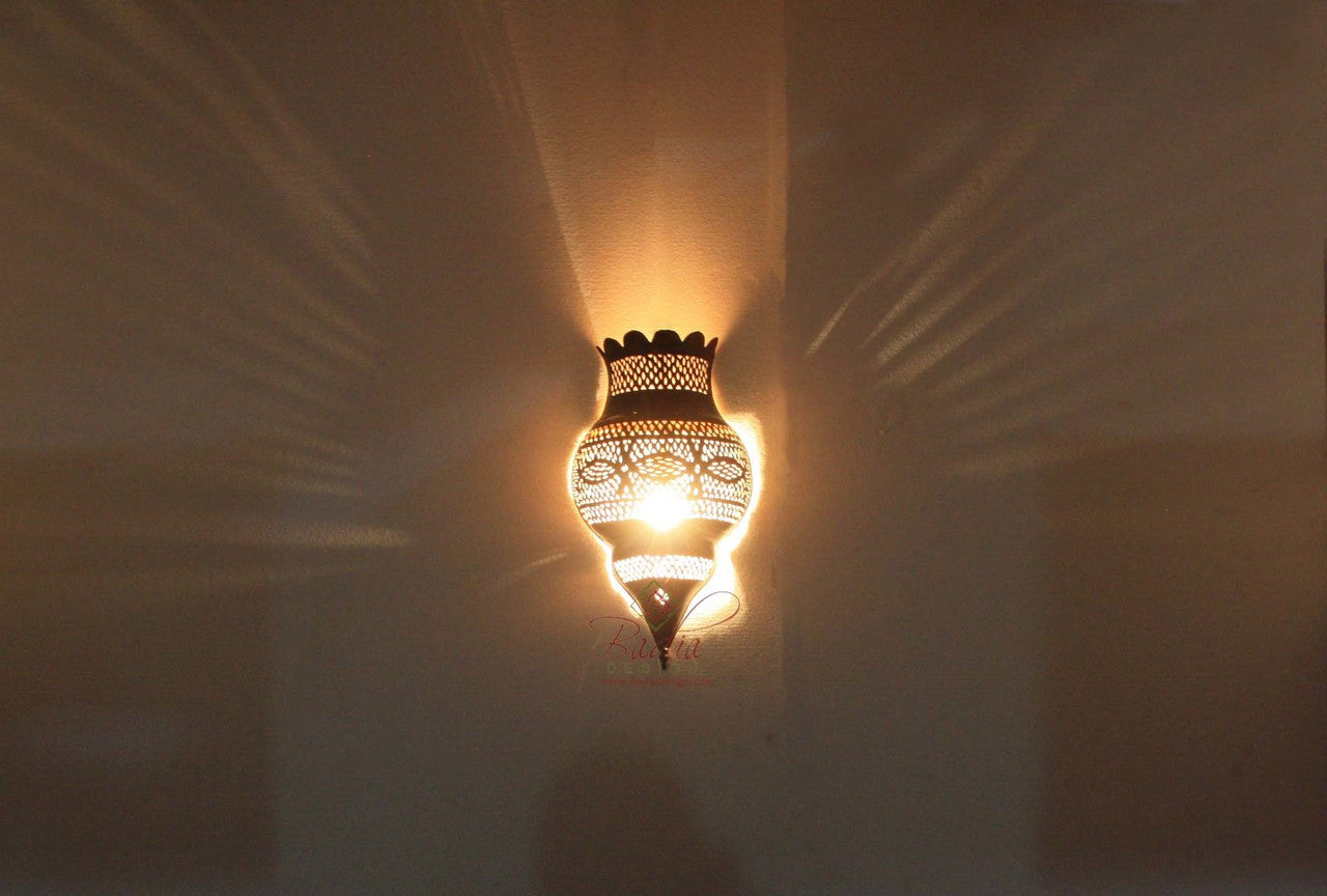 Moroccan Antique Brass Finish Wall Sconce with light background
