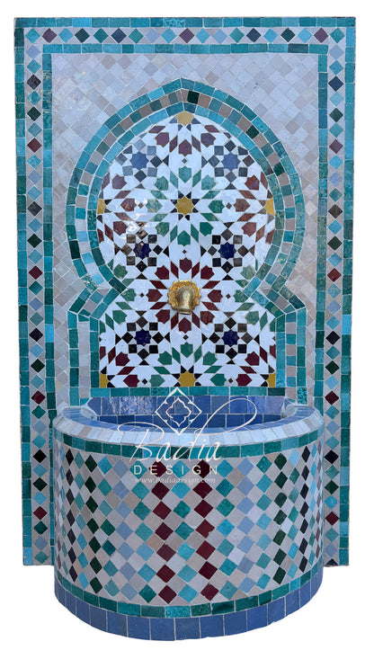A Moorish-style mosaic fountain wall and basin with intricate geometric tile patterns in turquoise, blue, white, green, burgundy, and gold, shown against a plain white background.