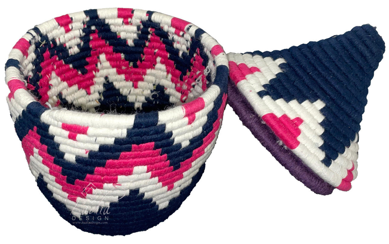 Woven basket with a colorful pattern on a white background