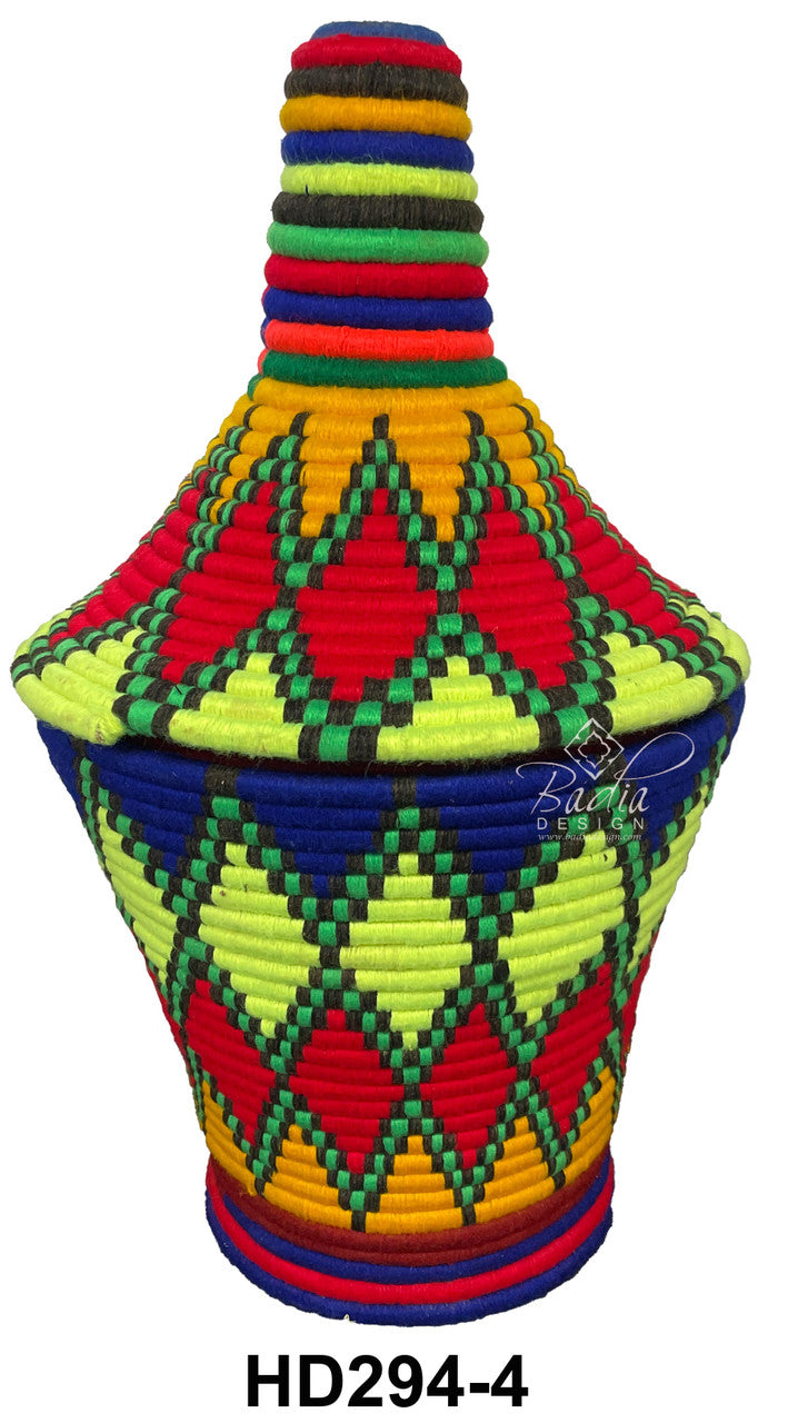 Colorful woven basket with geometric pattern on a white background