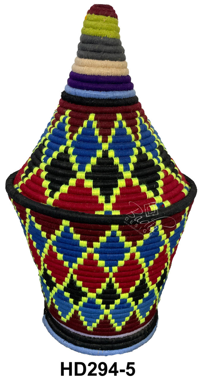Colorful woven basket with geometric pattern on a white background