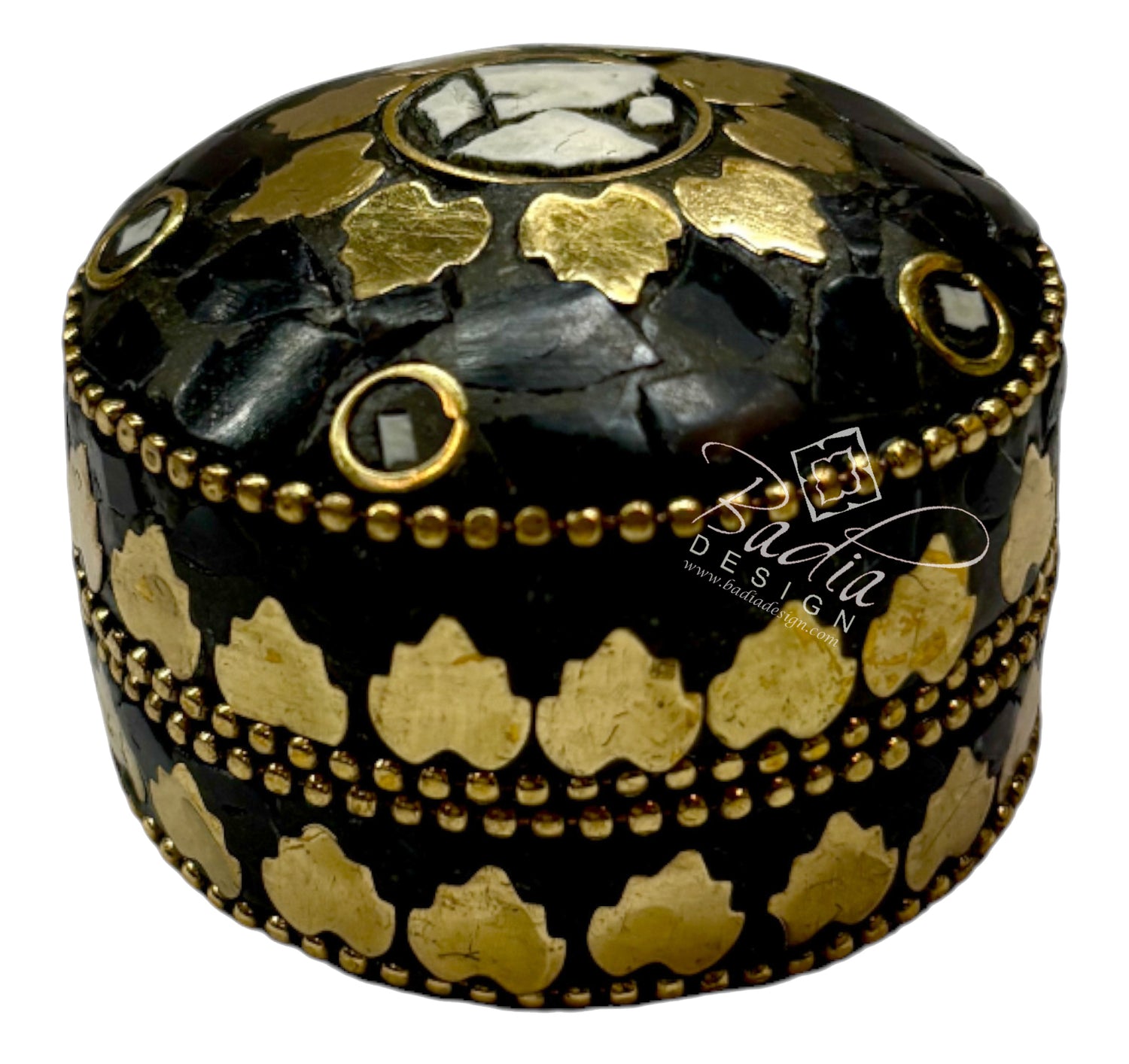 Decorative black and gold box with intricate patterns on a white background