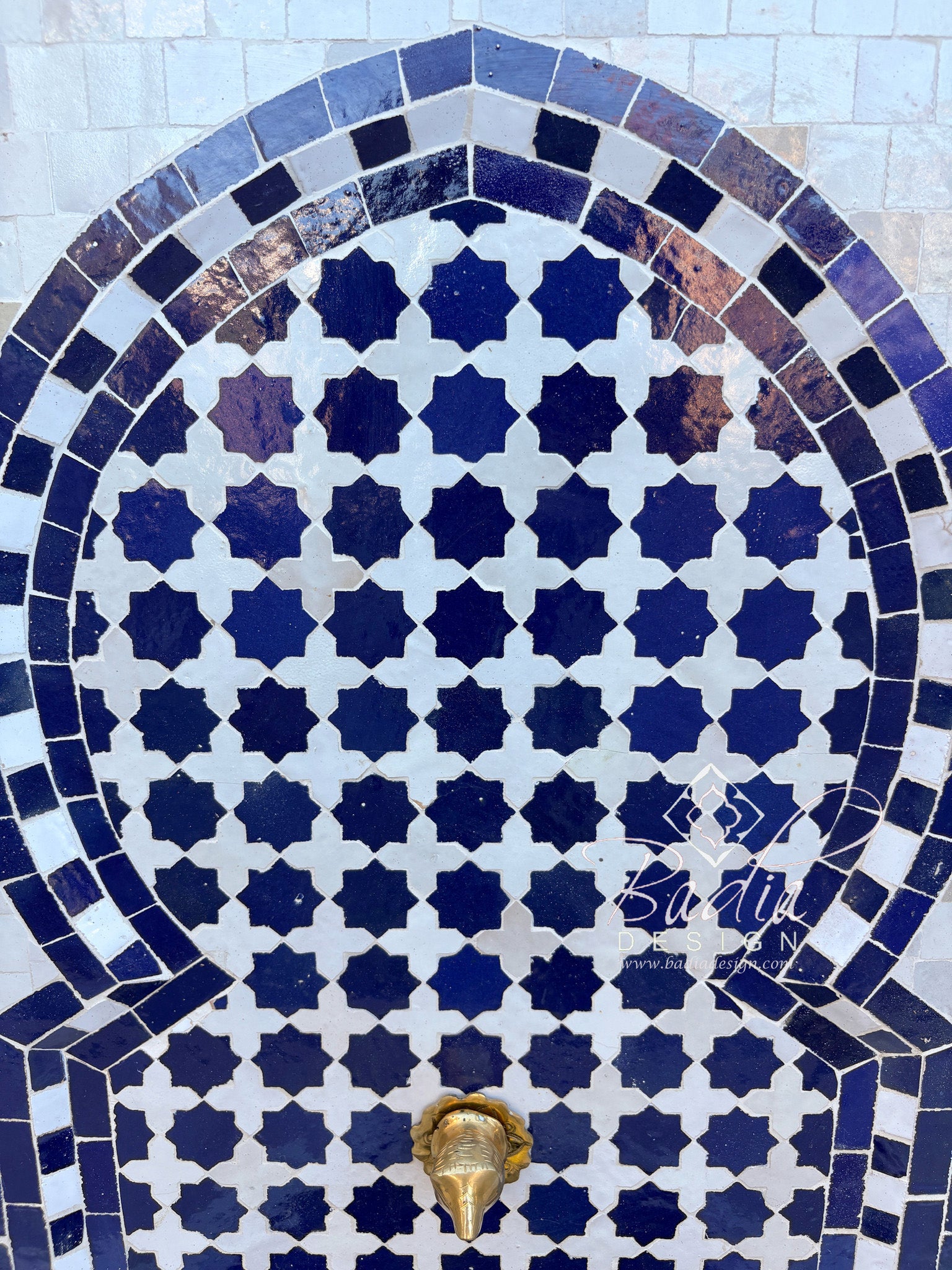 Close up of a Moroccan Blue and White Zellige Tile Water Fountain