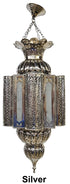 Decorative silver lantern with intricate designs on a white background