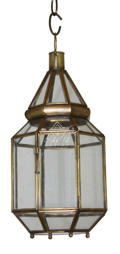 Decorative hanging lantern with brass finish and glass panels on a white background