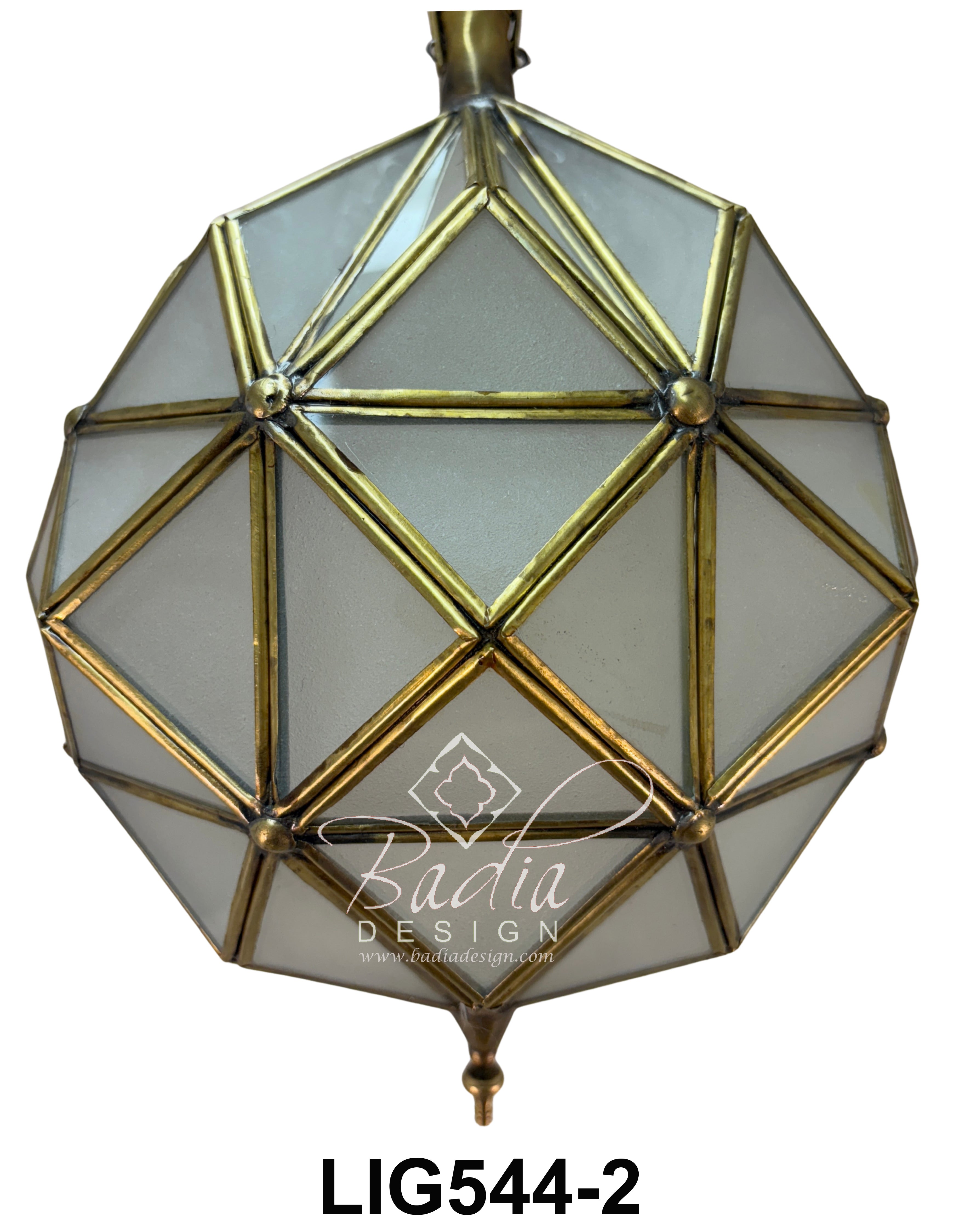 Geometric pendant light with brass accents on a white background, featuring the Badia Design logo.