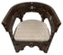 Decorative wooden chair with intricate carvings and a patterned cushion on a white background.