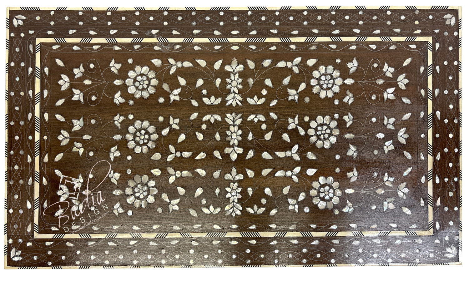 Decorative tray with floral patterns on a brown background