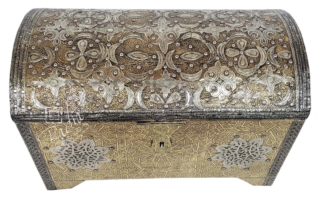 Decorative wooden box with intricate silver and gold patterns on a white background