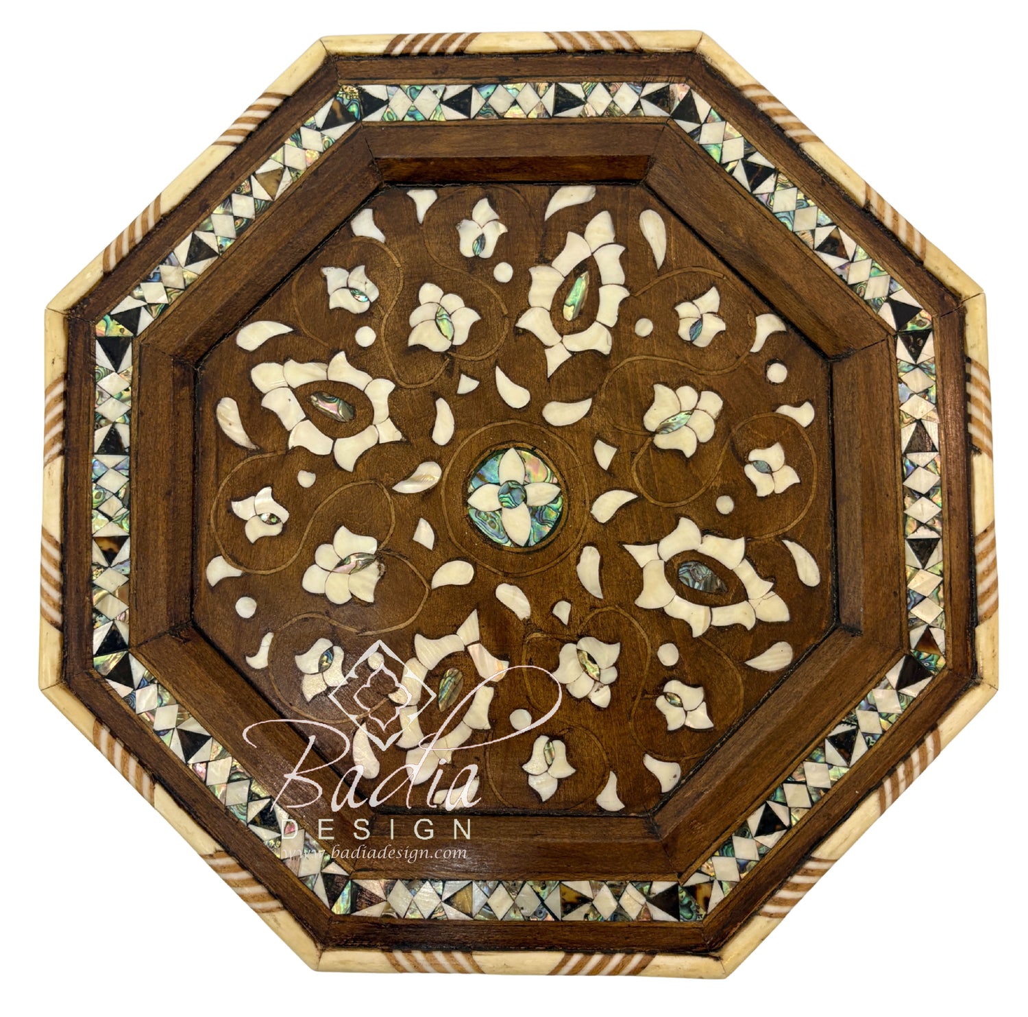 Decorative wooden panel with intricate inlay design on a white background