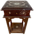 An ornate dark brown carved wooden console with a single drawer, intricate inlay details, and a lower shelf, shown on a plain white background.