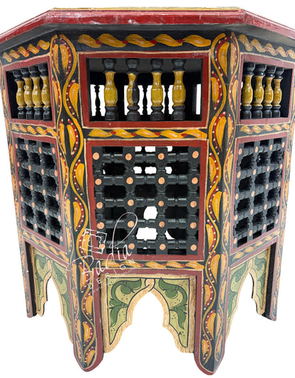 Green Decorative wine rack with intricate designs on a white background