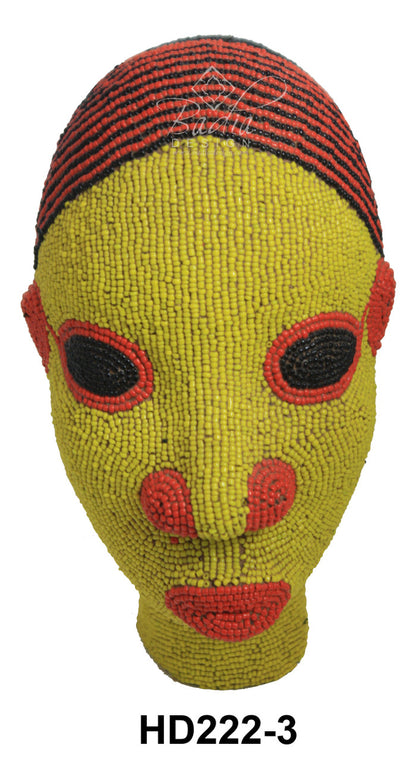 Textured mask with red and black patterns on a white background