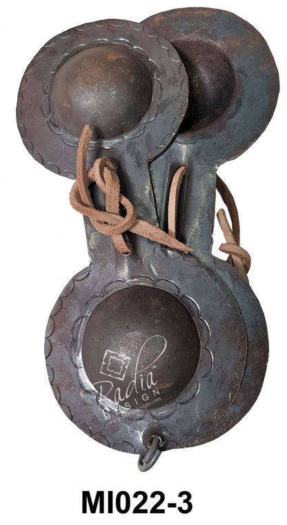 Vintage metal object with a rope, branded &