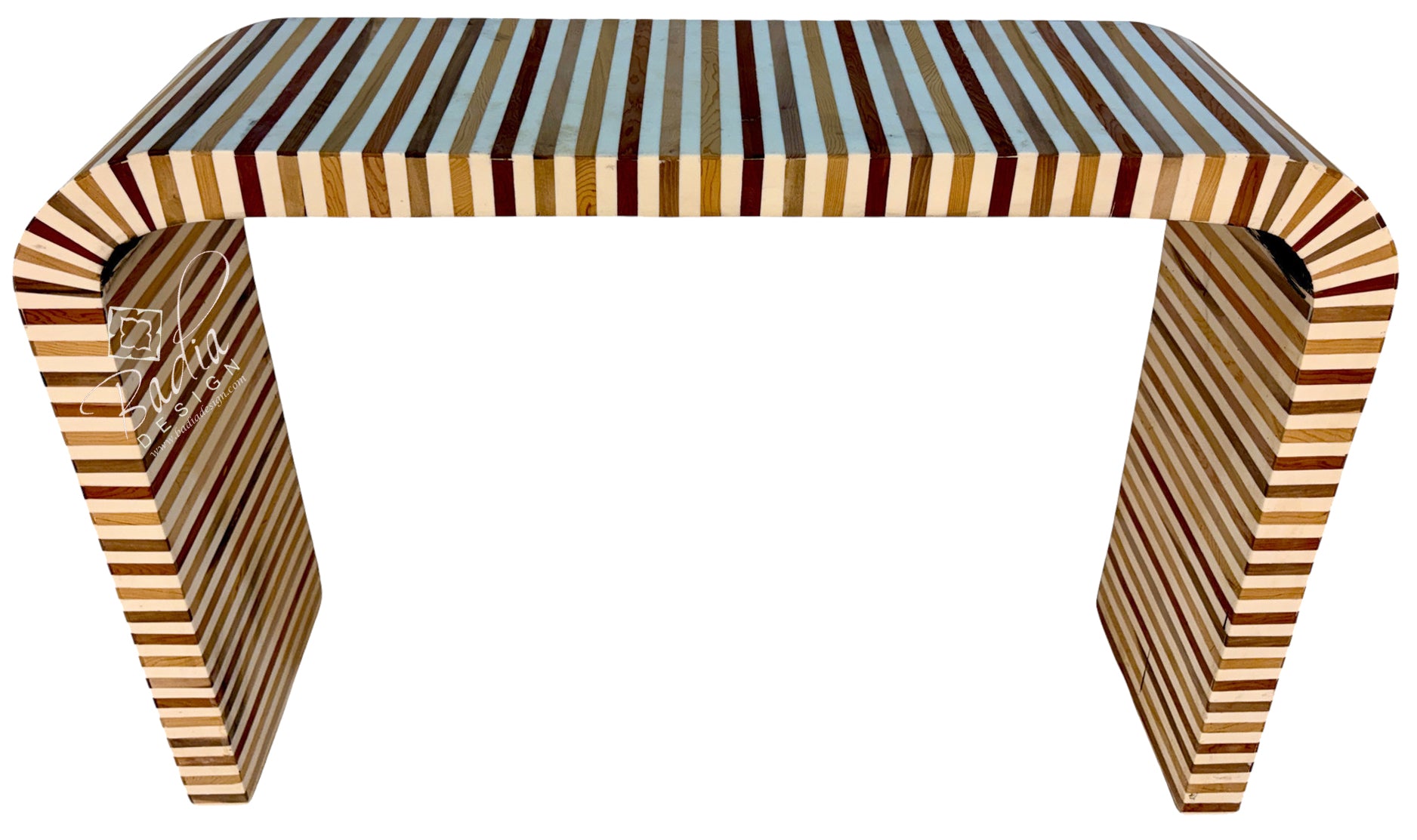 A modern console table with a curved top and legs, featuring a striped inlay pattern of light and dark wood tones, set against a plain white background.