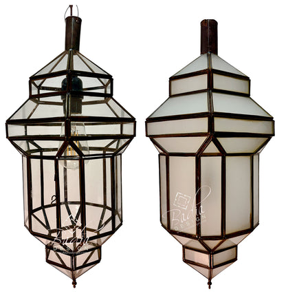 Two vintage-style geometric lanterns with dark metal frames and white frosted glass panels, shown side by side against a white background.
