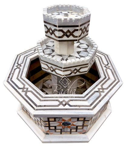 Moroccan marble fountain with geometric designs